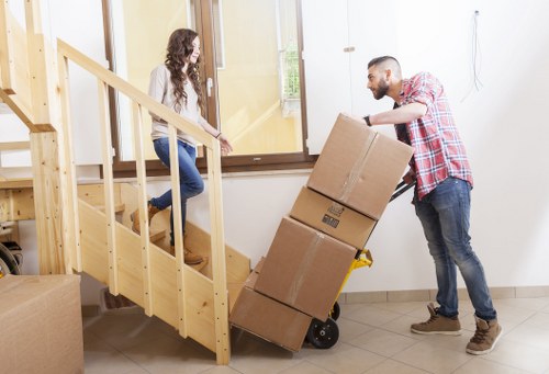 Careful loading of household furniture for storage in Kennington