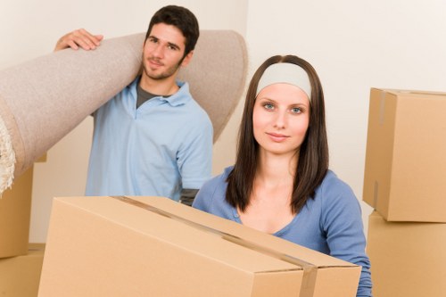 Boxes and furniture arranged in a new home after a Kennington move